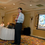Mass. law requires data to be protected SENSITIVE SUBJECT: Eric Shorr of PC Troubleshooters, standing, speaks at last weeks’ panel discussion on data protection at the Providence Marriott. /