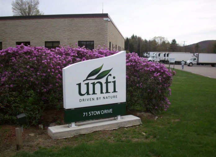 A UNITED NATURAL FOODS distribution center in New Hampshire. The company has raised its sales and earnings forecast for this fiscal year. / 