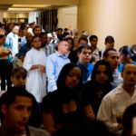 PEOPLE LINE UP at a job fair in Denver last month. The American economy added fewer jobs than expected in May as 15 million Americans remained unemployed. / 