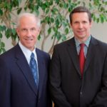 JOHN B. DAY, left, will be succeeded as president and CEO of Southcoast Health System next year by Southcoast Hospitals President and CEO Keith A. Hovan, right. / 