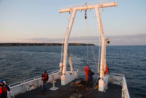 DEEP WATERS: The Endeavor deploys an acoustic listening device south of Block Island in 2008 for the ocean Special Area Management Plan. / DEEP WATERS: The Endeavor deploys an acoustic listening device south of Block Island in 2008 for the ocean Special Area Management Plan. /