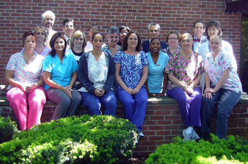 TEAM EFFORT: The staff at University Medicine receive an award and a bonus after five years with the company. / TEAM EFFORT: The staff at University Medicine receive an award and a bonus after five years with the company. /