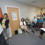 Training that is both fun and challenging leads to success NEW PERSPECTIVE: Amy Vine, project and training coordinator at Perspectives, leads a meeting about workplace efficiency. /