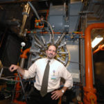 At hospital it pays to cogenerate Cogeneration is alive and well at Rhode Island Hospital, where Director Jeff Chalut, above, stands in front of a boiler that recycles heat produced from the generation of electricity. The captured heat helps warm hospital buildings in the winter and power systems that cool them in the summer. The hospital saves an estimated $2 million annually. /
