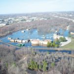 RECORD FLOODING in March left the Warwick sewage plant underwater for days. NOAA released a flood warning Tuesday, but local officials do not expect massive floods. / 
