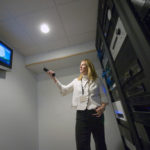 LEEDING THE WAY: Kimberly Lancaster Hageman checks the status of various systems in her home. / 