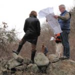 SURVEYING THE LAND: Susan Jennings, director of the UMass Dartmouth Office of 
Campus and Community Sustainability, and Peter Gagnon, UMass Dartmouth associate director, facilities planning design and construction, holding map, study the campus layout. / 