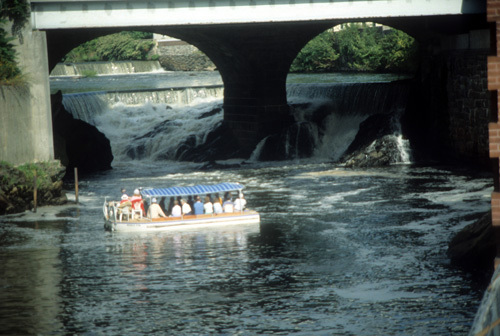 TAKING IT IN: Visitors aboard the Explorer, a sightseeing boat operated by the Blackstone Valley Tourism Council. / TAKING IT IN: Visitors aboard the Explorer, a sightseeing boat operated by the Blackstone Valley Tourism Council. /