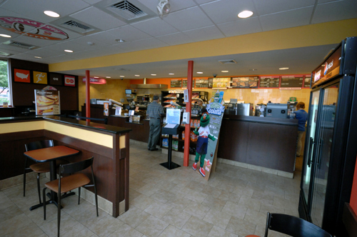 SETTING UP SHOP: Rob Batista, proprietor of the Dunkin’ Donuts at East Avenue in Warwick, said he will do more homework on the area surrounding his next franchise. / SETTING UP SHOP: Rob Batista, proprietor of the Dunkin’ Donuts at East Avenue in Warwick, said he will do more homework on the area surrounding his next franchise. /