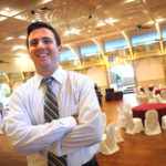 UP THE RIVER: Aaron Messina, catering sales manager for Russell Morin Fine Catering, seen here in the Rhodes on the Pawtuxet’s main ballroom. The Rhode Island mainstay has been under the management of Russell Morin since November 2008. / 