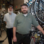 ENJOYING THE RIDE: Providence Bicycle owners Mark Rubenstein, left, and Barak Haldorsen opened their Providence location in 1994. They recently opened another shop, in Warwick. / 