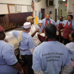 Café offers Amos House trainees real job skills FOOD FOR THOUGHT: Amos Culinary Education program participants, shown above, receive 12 weeks of food preparation and safety training. /