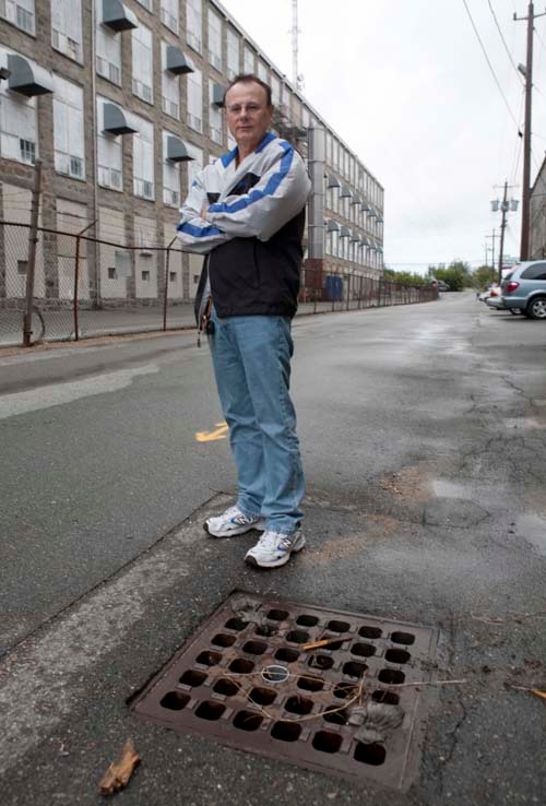 DOWN THE DRAIN: Roland Byam, Commonwealth Soap & Toiletries accountant, worries the company won’t see a return on its $3,055 quarterly stormwater fee. / DOWN THE DRAIN: Roland Byam, Commonwealth Soap & Toiletries accountant, worries the company won’t see a return on its $3,055 quarterly stormwater fee. /