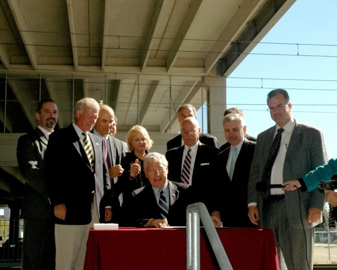 THE FINAL AGREEMENT TO COMMENCE COMMUTER RAIL SERVICE between Warwick and Boston was signed on Wednesday during a ceremony at T.F. Green. / THE FINAL AGREEMENT TO COMMENCE COMMUTER RAIL SERVICE between Warwick and Boston was signed on Wednesday during a ceremony at T.F. Green. /