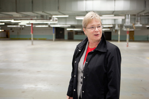 FIRST THINGS FIRST: HealthFirst Family Care Center CEO Julie Almond surveys the organization’s new 40,000-square-foot facility. The project is expected to cost $13 million and quadruple the center’s current size. / FIRST THINGS FIRST: HealthFirst Family Care Center CEO Julie Almond surveys the organization’s new 40,000-square-foot facility. The project is expected to cost $13 million and quadruple the center’s current size. /