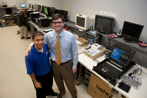 GIVING THEM A SHOT: PC Troubleshooters Inc. founder and President Eric M. Shorr, right, with company employee Leonel Padilla, who started as an intern from The Met School. / GIVING THEM A SHOT: PC Troubleshooters Inc. founder and President Eric M. Shorr, right, with company employee Leonel Padilla, who started as an intern from The Met School. /