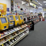 KODAK PHOTO PRINTING STATIONS STAND INSIDE A CVS/pharmacy store in Wyckoff, N.J. CVS reached an agreement with Connecticut for illegally dumping photo-processing chemicals into sewers. / 