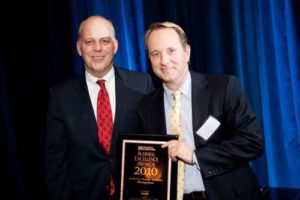 Meeting Street CEO John Kelly accepts the award for Excellence at a Nonprofit.