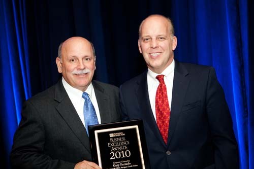 Honoree Gary Furtado, President and CEO of Navigant Credit Union and PBN Publisher, Roger Bergenheim