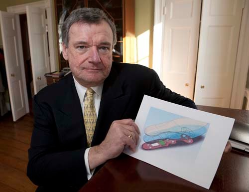 NEXT STEP: Steven Metzger, principal of Phoenix Medical Technologies, with a rendering of the vibrating insoles. / NEXT STEP: Steven Metzger, principal of Phoenix Medical Technologies, with a rendering of the vibrating insoles. /