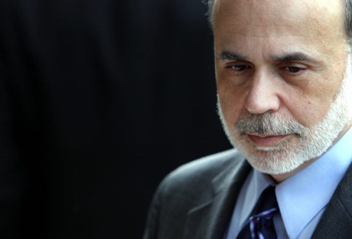 AS STOCKS rise and the economy shows signs of improving, Chairman Ben S. Bernanke (file photo) and his colleagues are trying to explain their record easing to investors expecting a pullback. / AS STOCKS rise and the economy shows signs of improving, Chairman Ben S. Bernanke (file photo) and his colleagues are trying to explain their record easing to investors expecting a pullback. /