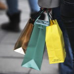 Sales at U.S. retailers fell short of analysts' projections last month as more people shopped early for the holidays and bad weather kept them from stores afterward. / 