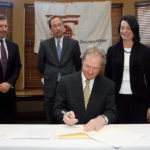 GOV. LINCOLN D. CHAFEE signed an executive order on Thursday morning establishing the R.I. Healthcare Reform Commission. / 