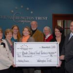 FROM LEFT: Vanessa Zampini, vice president and branch manager of Washington Trust; Jeanne Gattegno, president and CEO of Westbay Community Action; Kim Weeden, staff support of Rhode Island Center Assisting Those In Need; Liz Pasqualini, executive director of Jonnycake Center of Westerly; Russ Partridge, program director of W.A.R.M. Shelter; Diana Burdett, executive director of Providence Intown Churches Association; Joanne Gregory, social services director of Comprehensive Community Action Program; and Keith Lavimodiere, vice president and branch manager of Washington Trust. / 
