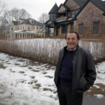 STAY A WHILE: Vincent Marcello of Bellevue Realtors, in front of a house he recently sold in Newport’s Kay/Catharine neighborhood. Rhode Island’s vacation-home market has begun to show signs of life following the recession. / 
