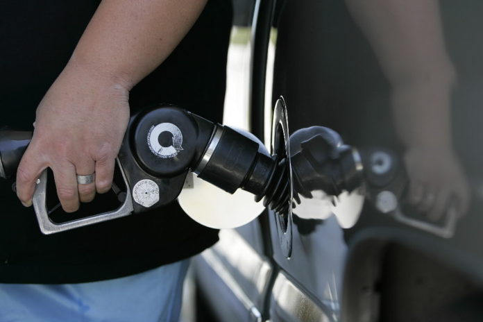 U.S. gasoline at the pump may rise 13 percent by May as crude oil in New York tops $100 a barrel and a recovering economy boosts fuel demand, according to analysts surveyed by Bloomberg News. / 