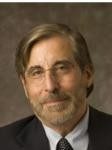 MICHAEL R. COOPER will become the new chief of Bryant University's College of Business. / 
