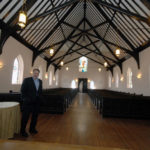 Bridal receptions on the upswing WARM RECEPTION: Hotel Viking General Manager Mark Gervais shows off a chapel owned by the hotel which is used for weddings. /