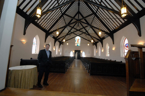 WARM RECEPTION: Hotel Viking General Manager Mark Gervais shows off a chapel owned by the hotel which is used for weddings. / WARM RECEPTION: Hotel Viking General Manager Mark Gervais shows off a chapel owned by the hotel which is used for weddings. /