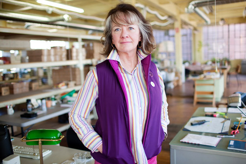 BETTER LATE THAN NEVER: KalaStyle owner Kate Smith didn’t have flood insurance on her Cranston property before last spring’s historic flooding. The damage led her to get insurance, as many other property owners did last year. / BETTER LATE THAN NEVER: KalaStyle owner Kate Smith didn’t have flood insurance on her Cranston property before last spring’s historic flooding. The damage led her to get insurance, as many other property owners did last year. /