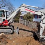 Cesspool law is digging up business for firms DIGGING DEEP: Jimmy Vangyzen, of Michael Perri & Sons, digs a test hole at a Providence property where the company was recently installing a septic system. /