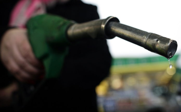 GASOLINE PRICES reached an average price of $4.02 per gallon for self-serve, unleaded regular at Ocean State stations on Monday. / 