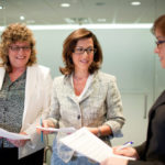 COUNTING ON HER: Renee Aloisio, center, director of internal operations for Lefkowitz, Garfinkel, Champi & DiRienzo, helped found Women Count. / 
