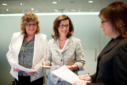 COUNTING ON HER: Renee Aloisio, center, director of internal operations for Lefkowitz, Garfinkel, Champi & DiRienzo, helped found Women Count. / COUNTING ON HER: Renee Aloisio, center, director of internal operations for Lefkowitz, Garfinkel, Champi & DiRienzo, helped found Women Count. /