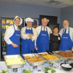 EMPLOYEE BENEFITS: Partners of Hinckley, Allen & Snyder serve breakfast to employees on Employee Appreciation Day. From left: Mark Meredith, Michael Tauber, Jerry Batty, Florence Trombetti and Paul Silver. PHOTO COURTESY HINCKLEY, ALLEN & SNYDER /