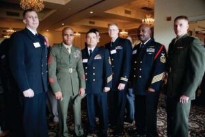 Members of the US Navy and Marine Corps, attended with Honoree Major Phillips  / Rupert Whitely