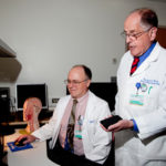 SMART IDEA: R.I. Hospital Associate Chief Medical Physicist Bruce Curran, left, and Medical Physicist-In-Chief Edward S. Sternick are leading a project to integrate smartphone use into patient care. / 