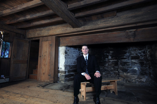 LIVING HISTORY: Dan Santos, above in the Arnold House, is southeastern New England site manager for Historic New England. He says his interest in history began while growing up on a farm, finding arrowheads and hearing stories about King Philip’s War. / LIVING HISTORY: Dan Santos, above in the Arnold House, is southeastern New England site manager for Historic New England. He says his interest in history began while growing up on a farm, finding arrowheads and hearing stories about King Philip’s War. /