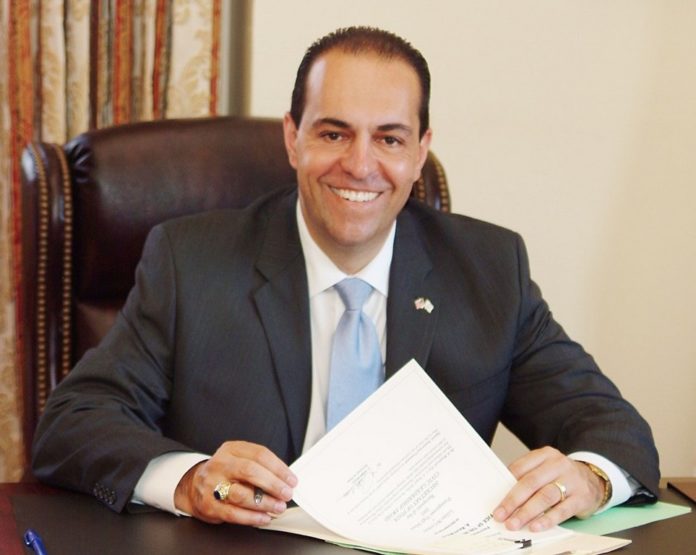 SECRETARY OF STATE A. Ralph Mollis initiated the legislation, signed into law July 12, that moves the state presidential primary vote to April from March. / SECRETARY OF STATE A. Ralph Mollis initiated the legislation, signed into law July 12, that moves the state presidential primary vote to April from March. /