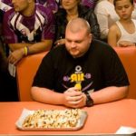 CONNOR MCQUADE, local rugby player, took on the Olneyville NY System wiener challenge in the Man v. Food Nation episode that will air Wednesday at 9 p.m. / COURTESY TRAVEL CHANNEL