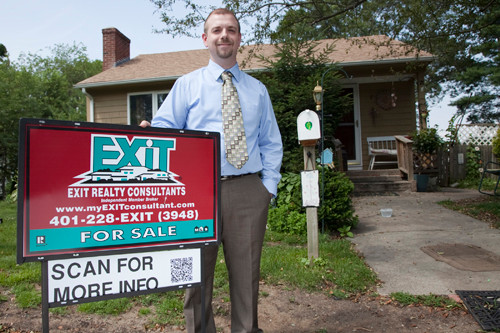 RESPOND AND REACT: Manny Menezes, owner of Exit Realty Consultants, says that
traffic from QR codes is currently modest, but he sees potential for growth. / PBN PHOTO/NATALJA KENT RESPOND AND REACT: Manny Menezes, owner of Exit Realty Consultants, says that
traffic from QR codes is currently modest, but he sees potential for growth. / PBN PHOTO/NATALJA KENT