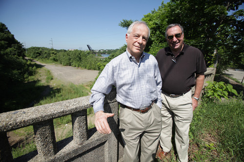 INROADS: Brothers Joel, left, and David Cohen own two properties that will be along Waterfront Drive, including an old mill complex. / PBN PHOTO/RYAN T. CONATY INROADS: Brothers Joel, left, and David Cohen own two properties that will be along Waterfront Drive, including an old mill complex. / PBN PHOTO/RYAN T. CONATY