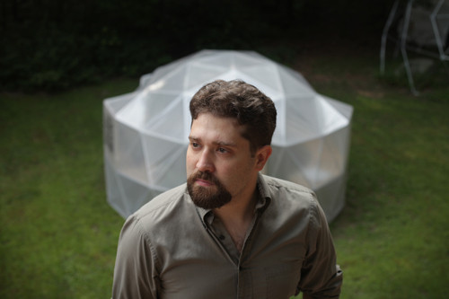 GOT IT COVERED: Justin Goslin, owner of Sunrise Domes in Glocester, make and installs igloo-shaped geodesic domes, which are used as greenhouses, carports, storage sheds, aviaries, tents and canopies. / PBN PHOTO/RYAN T. CONATY GOT IT COVERED: Justin Goslin, owner of Sunrise Domes in Glocester, make and installs igloo-shaped geodesic domes, which are used as greenhouses, carports, storage sheds, aviaries, tents and canopies. / PBN PHOTO/RYAN T. CONATY