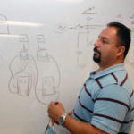 A problem solver for Internet age TECH SUPPORT: Jairo Rugel, owner of ATC Tech, founded the company nine years ago. Today, it manages computers for more than 200 clients throughout the world. / PBN PHOTO/BRIAN MCDONALD