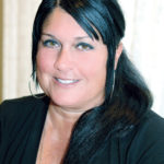 GOOD COMPANY: Sherri Lynn Carrera, small-business ombudsman for EDC, says that Every Company Counts has helped more than 3,000 small-business owners since she arrived. / PBN PHOTO/BRIAN MCDONALD
