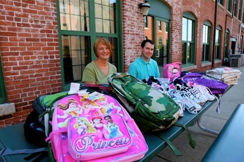 CAROL WRIGHT, payroll accountant at Collette Vacations, and Chris Cahill, programmer at Collette Vacations, display the supplies collected for the Granja Hogar boarding school through Collette Foundation’s Mexico Task Force. CAROL WRIGHT, payroll accountant at Collette Vacations, and Chris Cahill, programmer at Collette Vacations, display the supplies collected for the Granja Hogar boarding school through Collette Foundation’s Mexico Task Force.